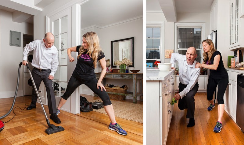 A girl is teaching exercise to a old man with the help of a vacuum cleaner