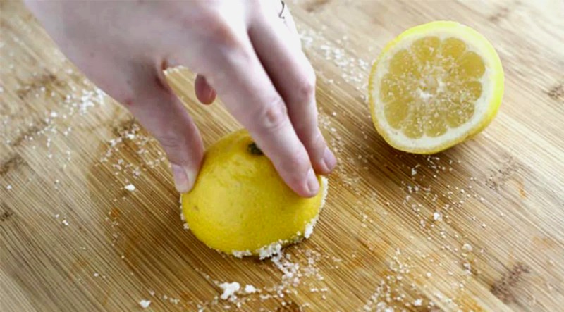pieces of half cut lemon with salt