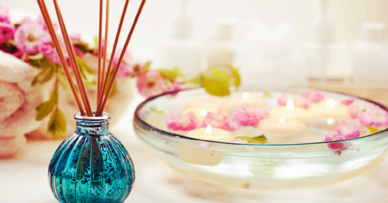 homemade diffuser sticks in a glass bottle