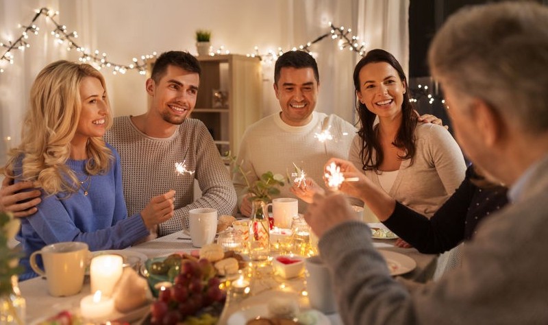 a family enjoying thanksgiving party at their house