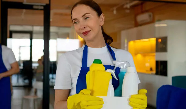 young professional ready to clean a property
