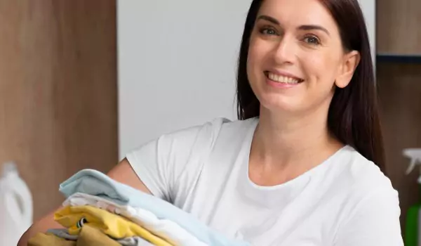 woman with a dump of clothes